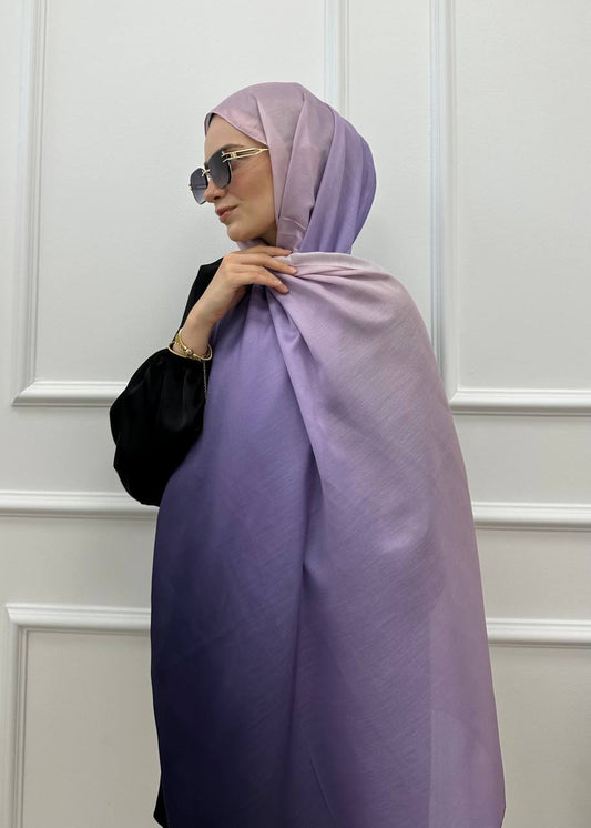 MODESTIQUE Ombre Hijab in lavender, fading from pale lilac to deep purple, styled with sunglasses.