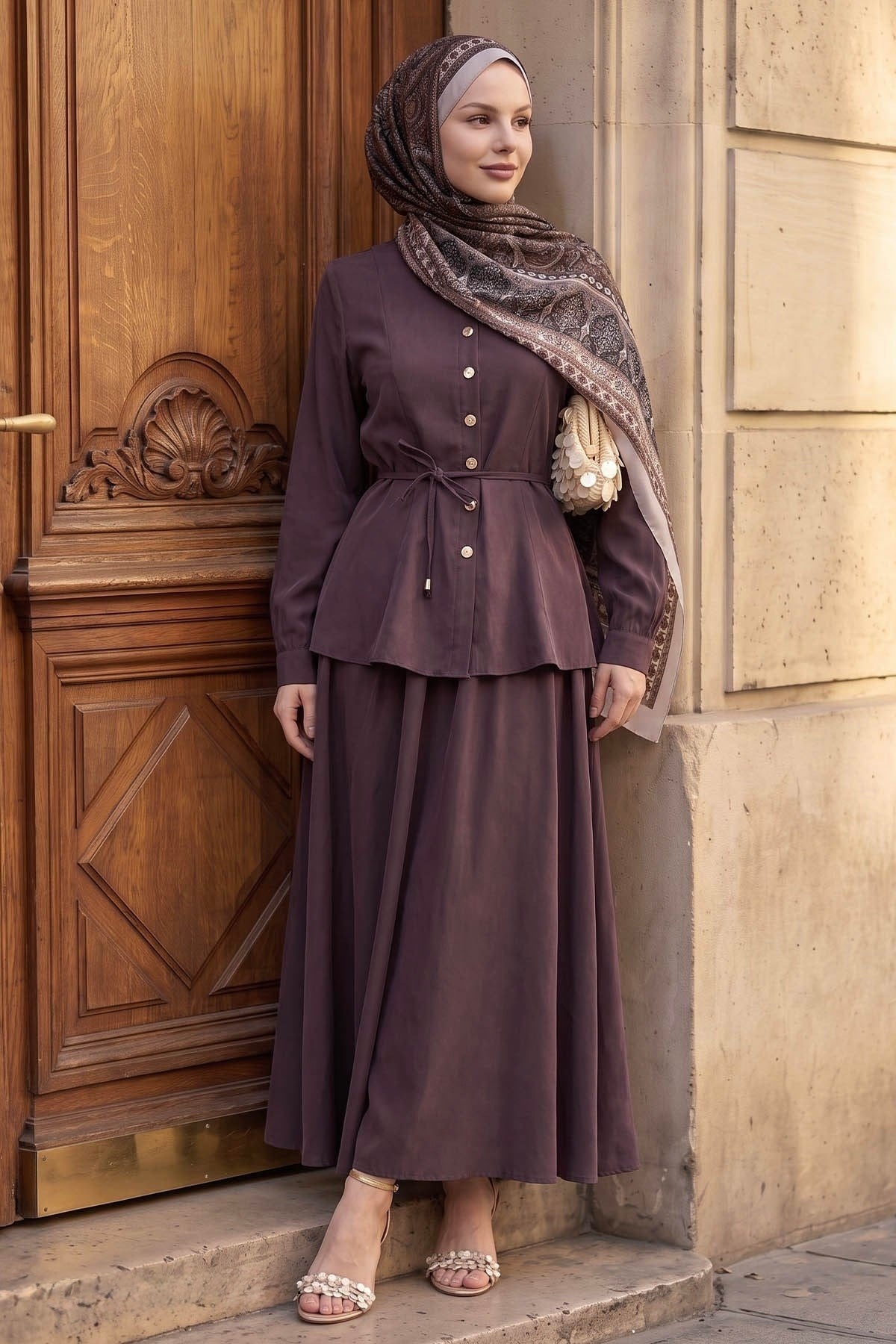 Ayla modest skirt set in burgundy worn with a printed hijab, front view