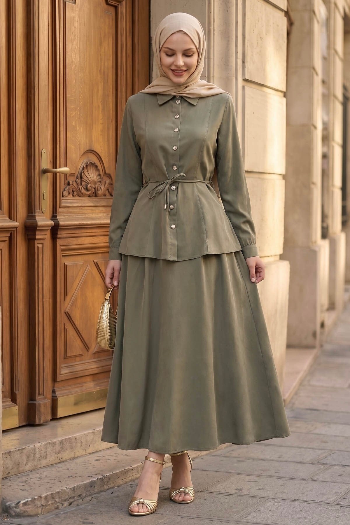 Ayla modest skirt set in sage with a clutch, full-length front view