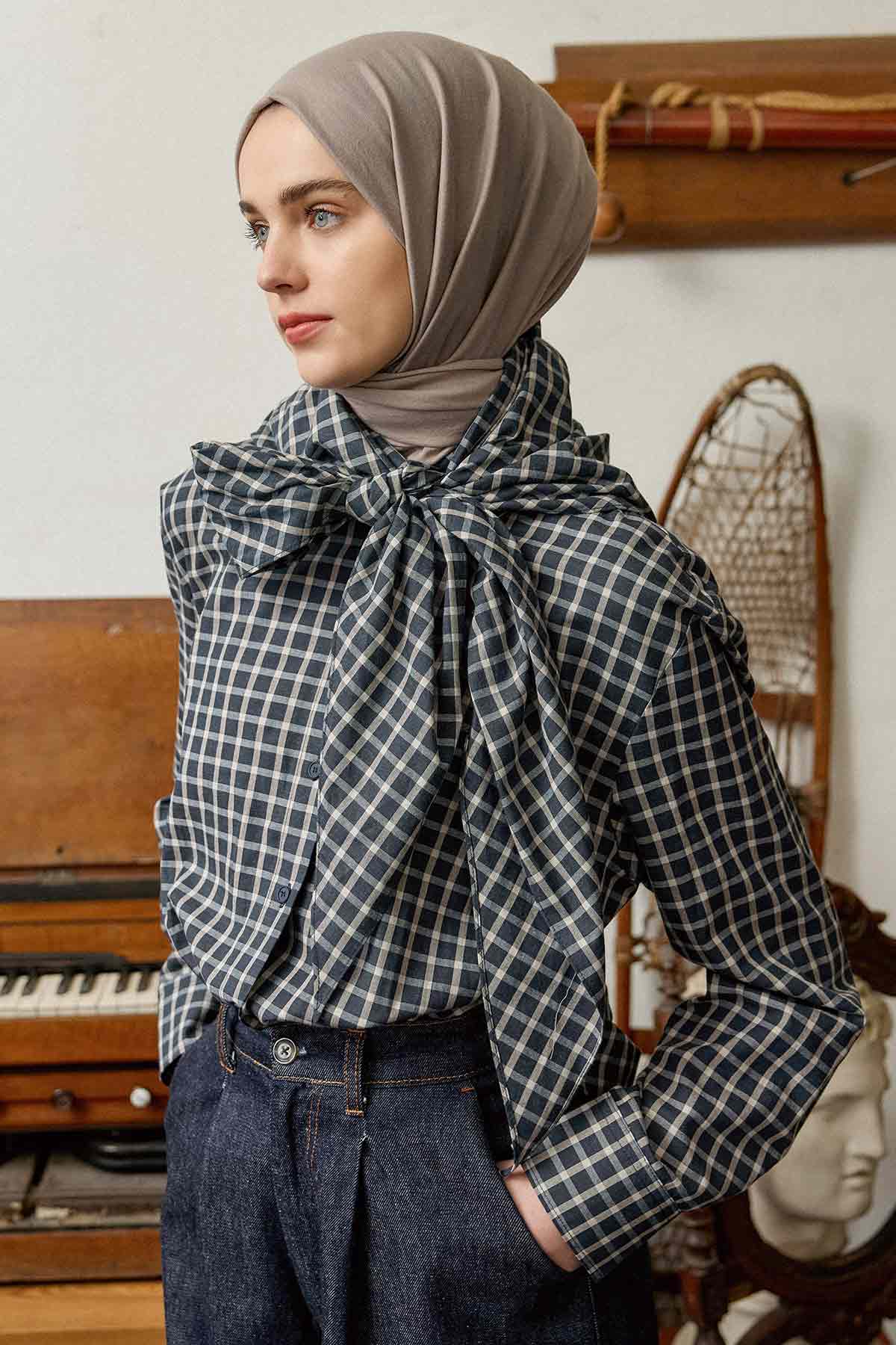 Taupe Comfort Cotton Hijab styled with a houndstooth top, three-quarter view