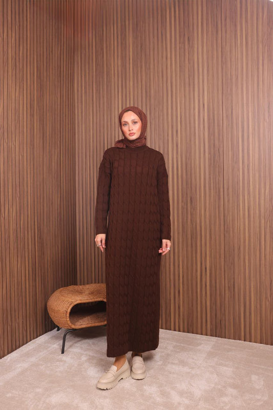 Full-length front view of the MODESTIQUE Cable Knit Dress in Brown, a long sweater dress with a cable pattern.
