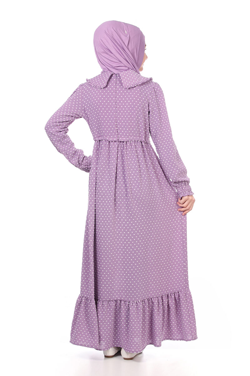Back view of the Zara girls' modest maxi dress in purple polka dot with gathered waist and ruffle hem