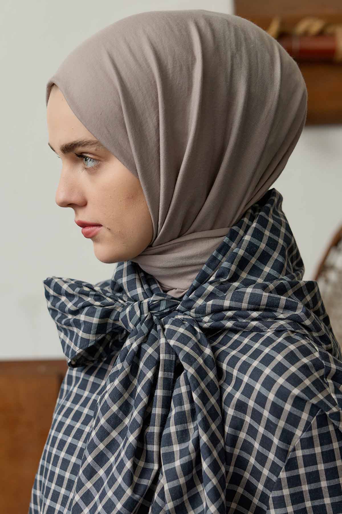 Close-up of the taupe Comfort Cotton Hijab showing the soft fabric and drape